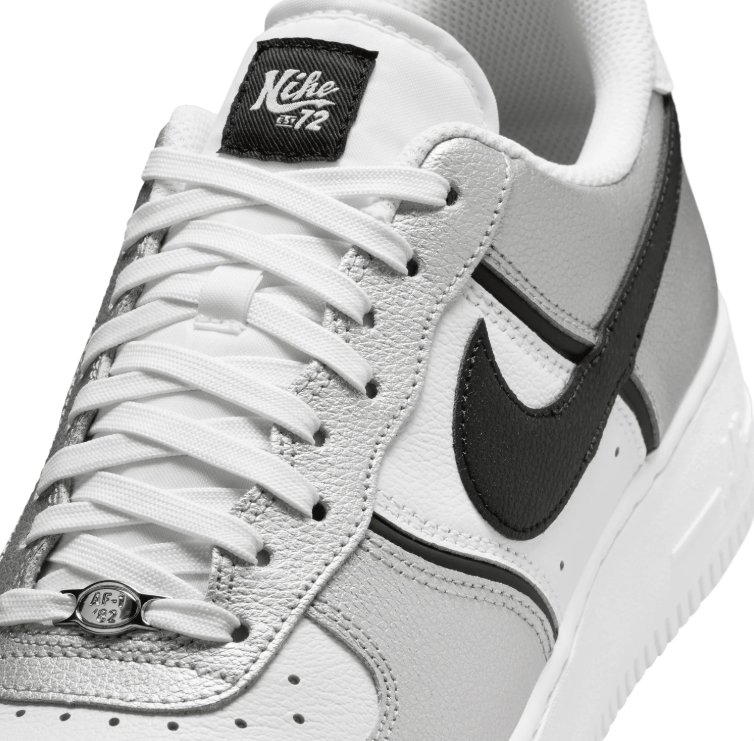 Nike Low-Top Sneakers - White & Metallic Silver with Black Details